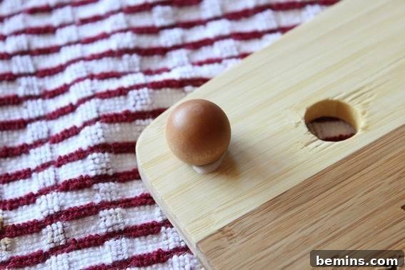 Gluing the Wooden Ball Knobs to the Cooling Board