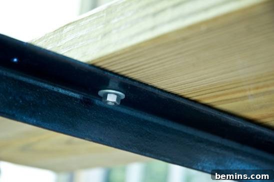 Securing the Carriage Bolts with Washers and Nuts