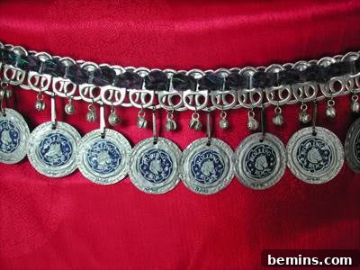 Stylish belt made from soda can tabs and beer bottle caps