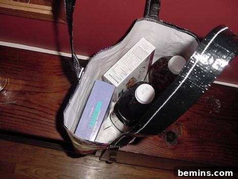 A bird seed bag grocery tote carrying groceries