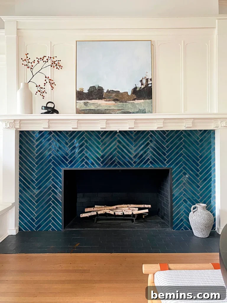 Inspired Fireplace Tile Designs for a Warm Home 18 Deep blue herringbone tile fireplace design from REEMS Design