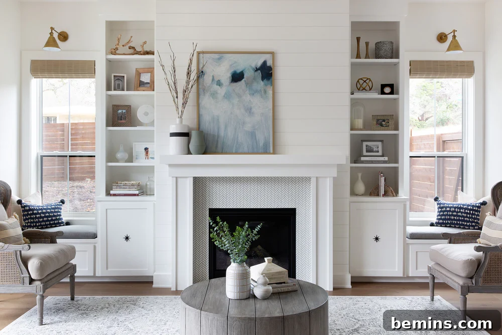 Inspired Fireplace Tile Designs for a Warm Home 19 Soft white herringbone tile fireplace from Nuela Designs; Photography: Molly Culver Photography