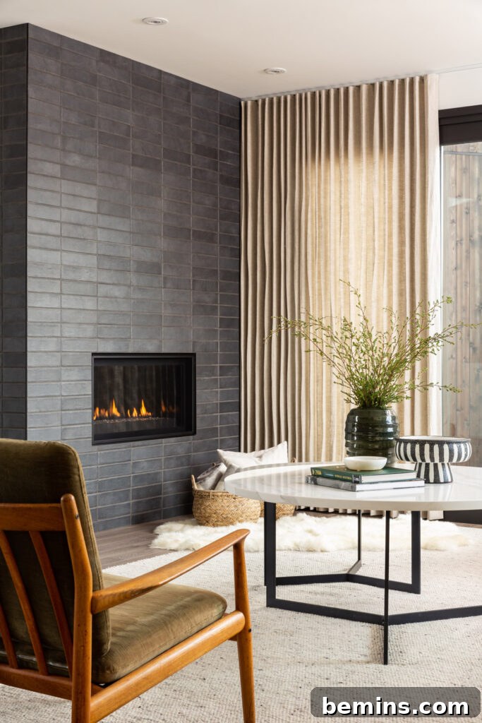 Inspired Fireplace Tile Designs for a Warm Home 21 Dark mid-century tile fireplace from Rue Daily.