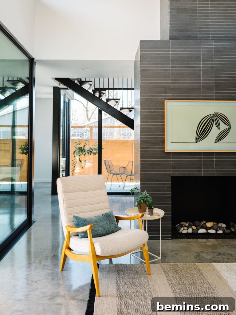 Inspired Fireplace Tile Designs for a Warm Home 5 Modern gray subway tiles with white grout from The Effortless Chic
