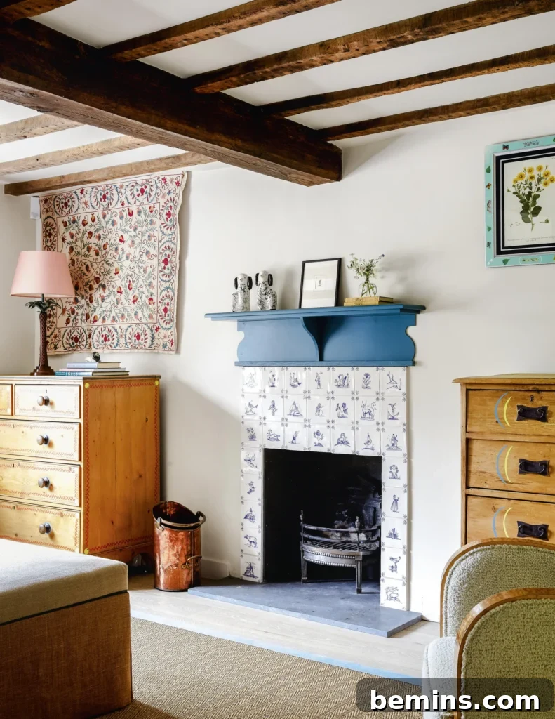 Wood-burning fireplace with traditional blue tiles.