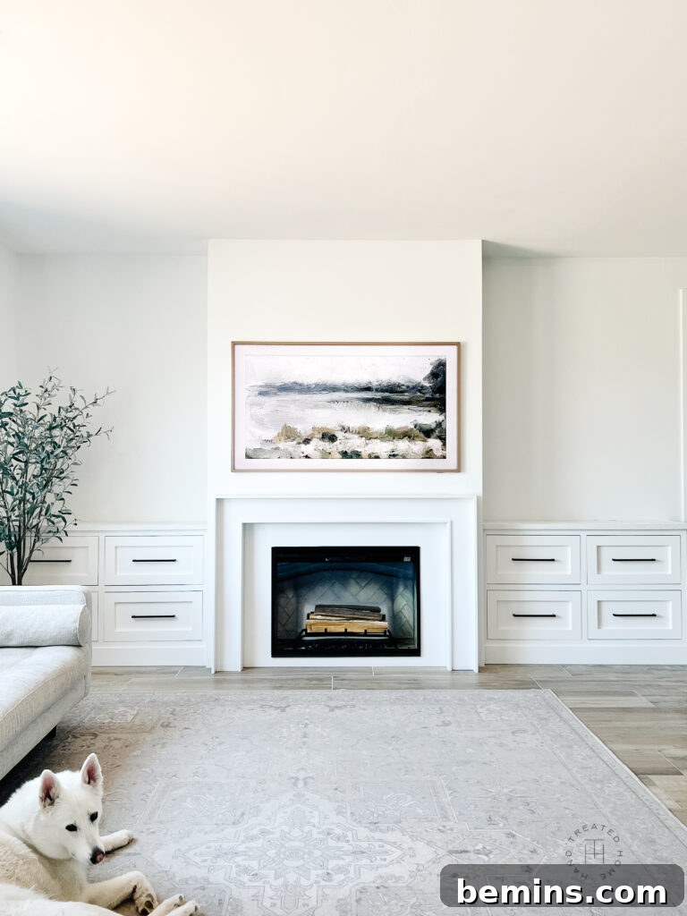 Beautiful fireplace mantel and electric insert.