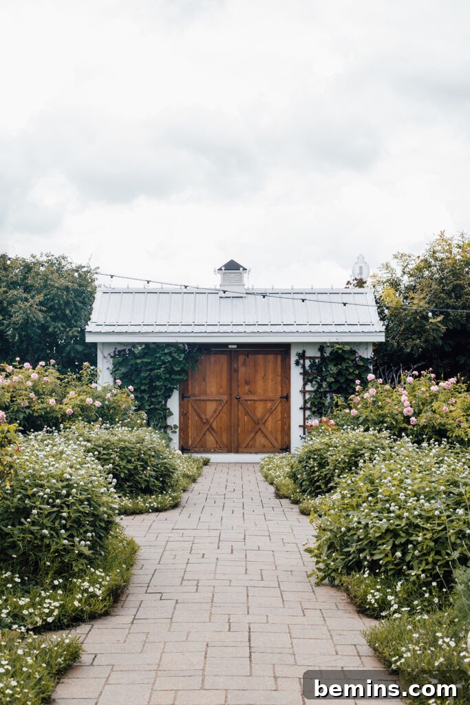 Crafting Your Dream Spring Garden: A Comprehensive Guide 2 Barn with flowering shrubs, showcasing spring garden possibilities