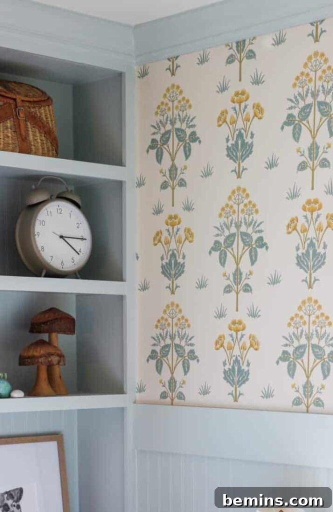Floral cottagecore wallpaper paired with soft paint colors. Image and wallpaper tutorial at Wildflower Home.