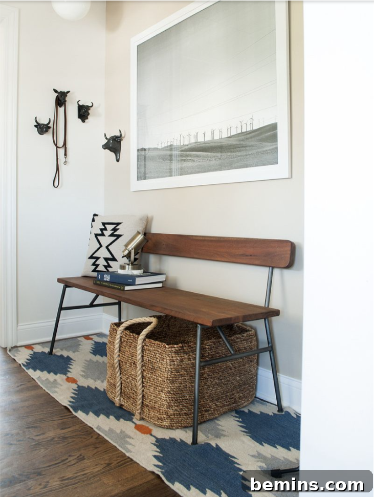 Entryway baskets under a bench to hide your shoe storage.