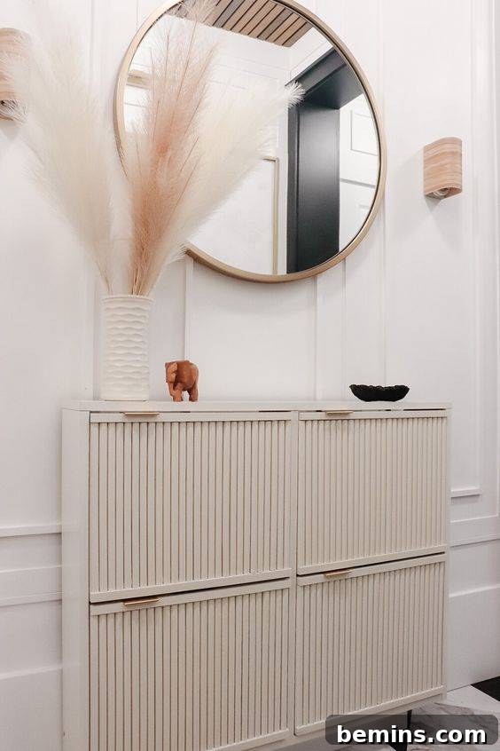 Shoe storage cabinet with fluted fronts.