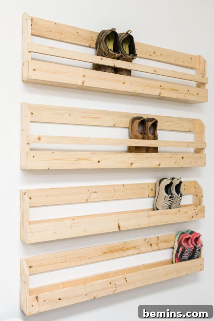 DIY wooden wall-mounted shoe rack.