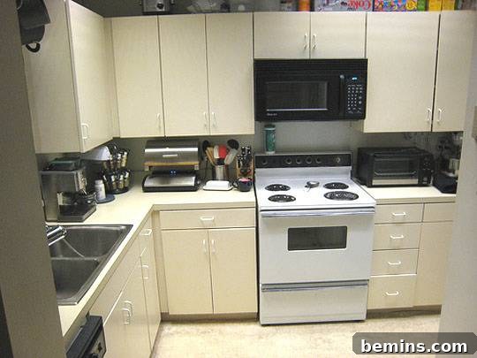Before: Jason's white kitchen before the red cabinet makeover