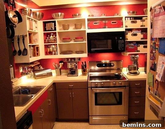 After: Jason's kitchen with rich red lower cabinets and open upper shelves