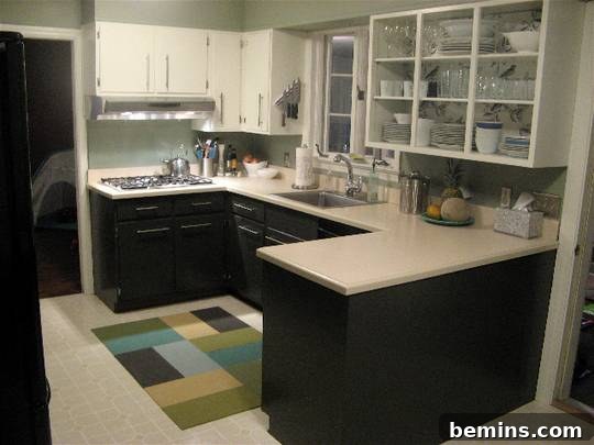 After: Melissa's kitchen with white upper and black lower cabinets