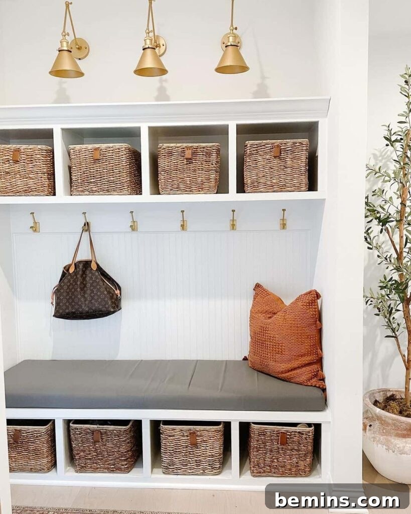 Modern mudroom with bench and storage compartments