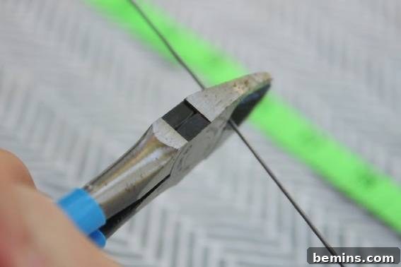 Creating a Contemporary Geometric Mobile: A DIY Guide 8 Cutting Piano Wire