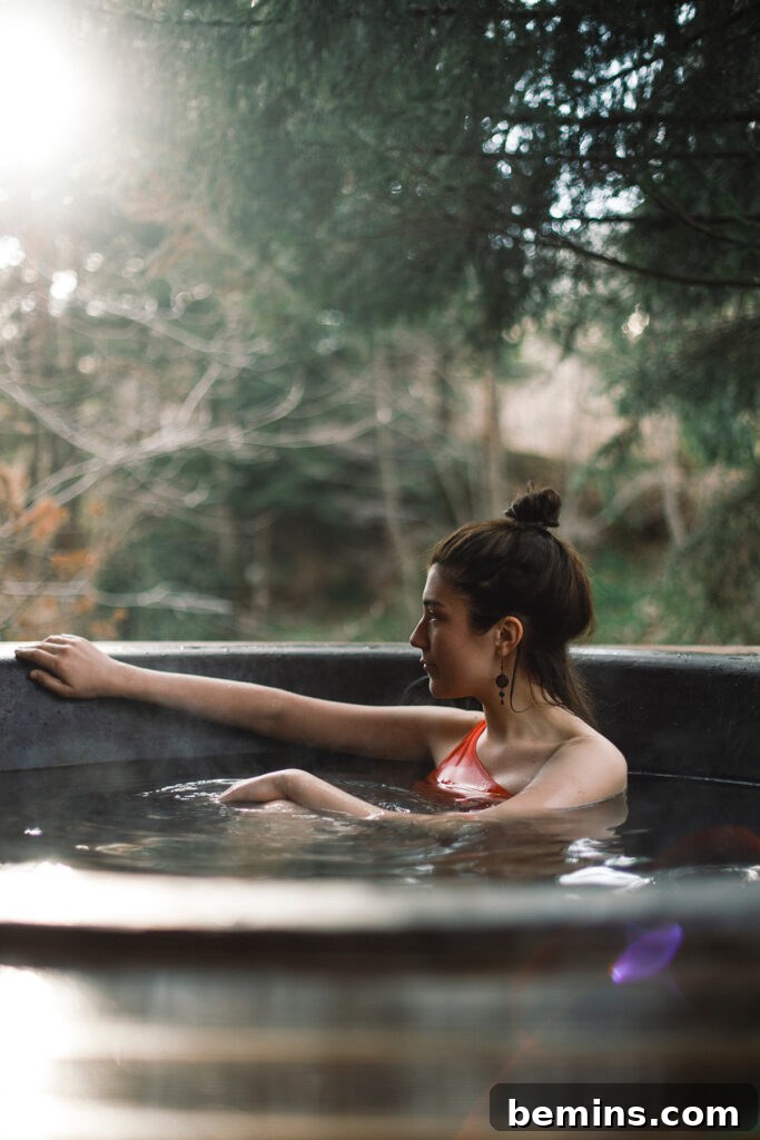 Girl soaking in a wood-fired hot tub