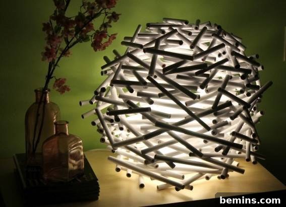 10 Rad Upcycled Lamps to Light Up Your Life 3 Lamp made from rolled newspaper tubes