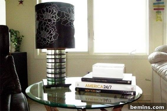 10 Rad Upcycled Lamps to Light Up Your Life 7 Unique CD and DVD lamp on glass table