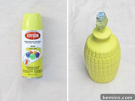 Spraying the lamp base with the desired color.
