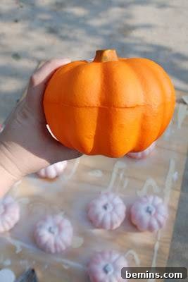 Orange Styrofoam pumpkin before its makeover.