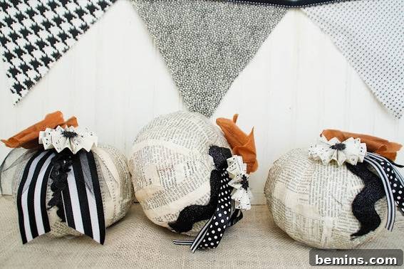 White Christmas ornaments with navy blue ribbons