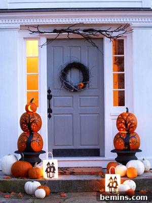 Front door Halloween decorations with black pumpkin topiary