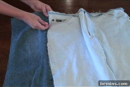 How to Sew Your Own Overalls 19 A person is making a pair of jeans.