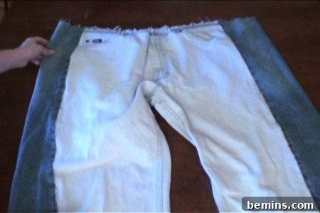 How to Sew Your Own Overalls 23 A person is holding a pant.