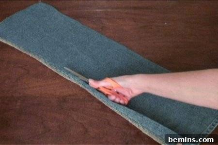How to Sew Your Own Overalls 46 "Jeans leg cutted with scissor."