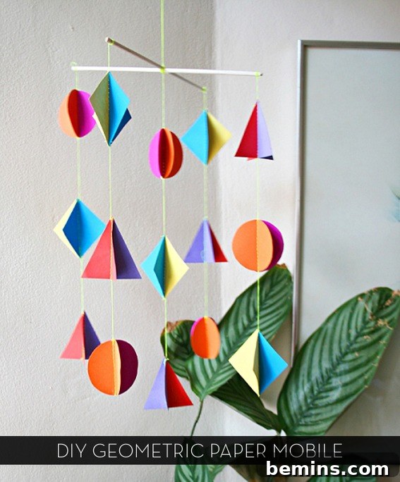 A colorful DIY paper mobile hangs gracefully.
