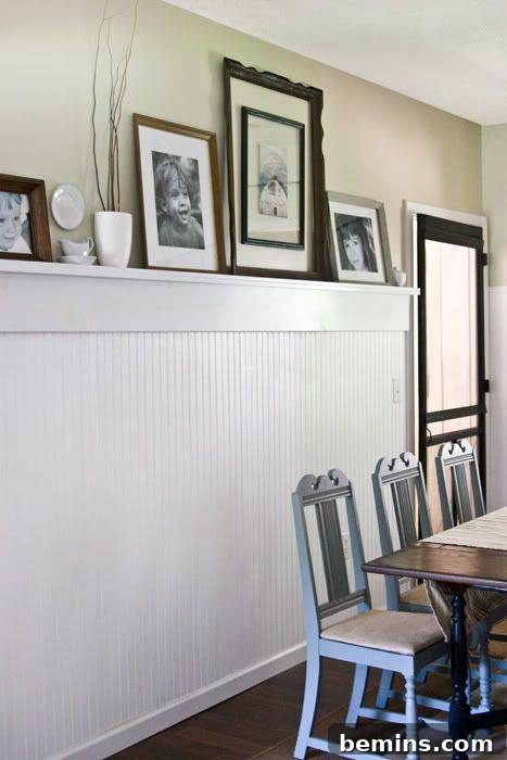 Charming Wainscoting: 21 Ways to Elevate Your Home 22 Wainscoting with plate rail holding photos in front of dining table