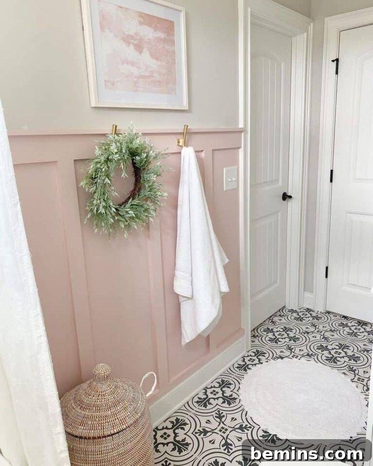 Charming Wainscoting: 21 Ways to Elevate Your Home 4 Pink board and batten wall wainscoting with grey tile floor and white round rug.
