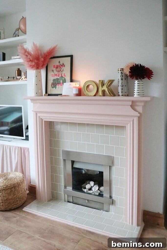 Pastel pink fireplace mantel with white brick