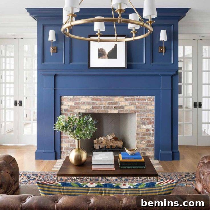 Blue fireplace with beige brick and brown coach, behind brown coffee table