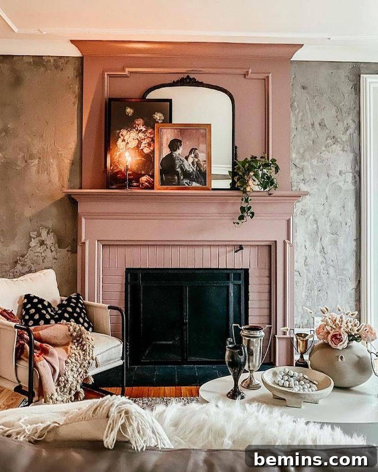 Mauve fireplace with grey background, mirror and art on mantle