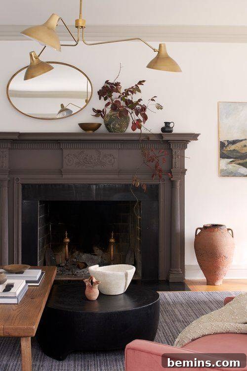 Chocolate painted fireplace in living room behind coffee table