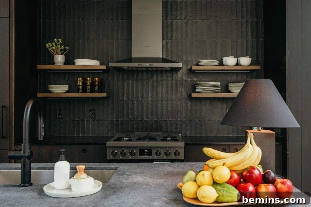 A bowl of fruit sitting on a kitchen counter