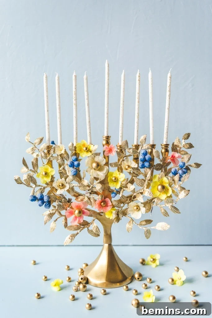 Show stopping DIY paper flower menorah from The House That Lars Built.