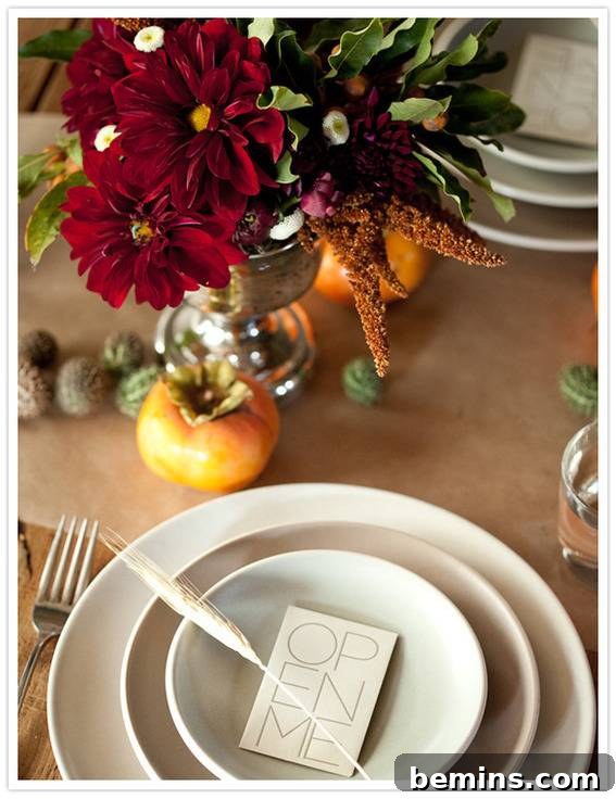 Fall celebration table setting with vibrant colors and seasonal produce.