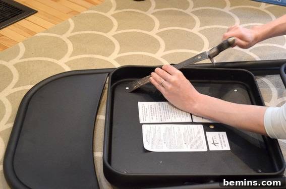 Removing rivets from folding chair