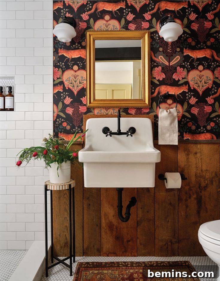 Wood wainscoting in bathroom with rustic wallpaper