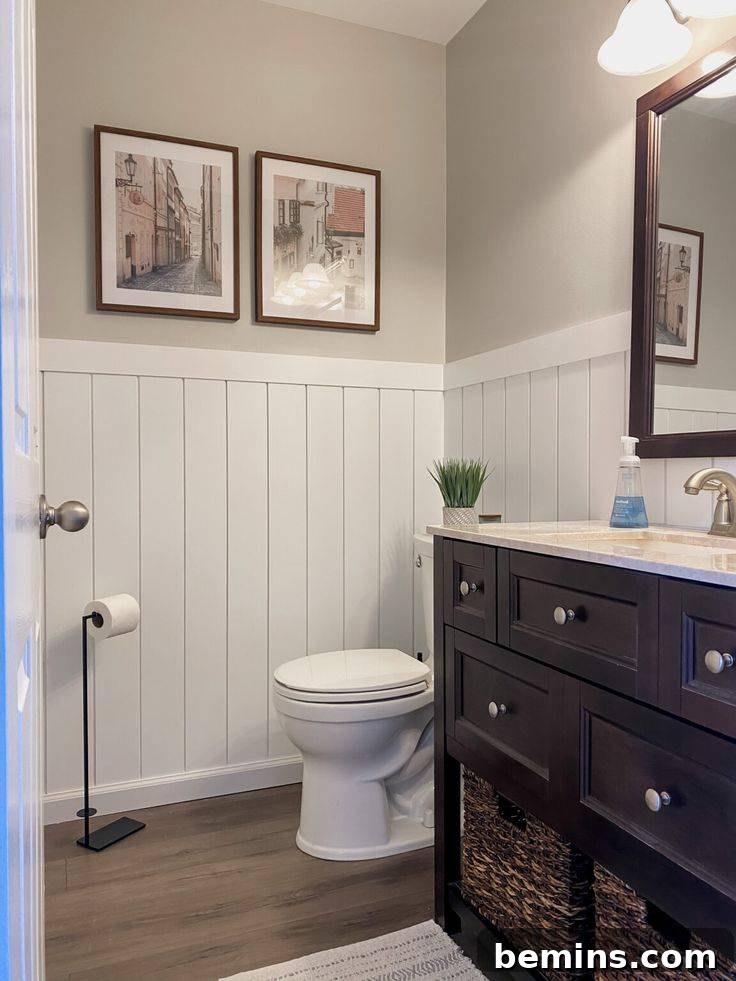 Shiplap wainscoting in cream and brown bathroom