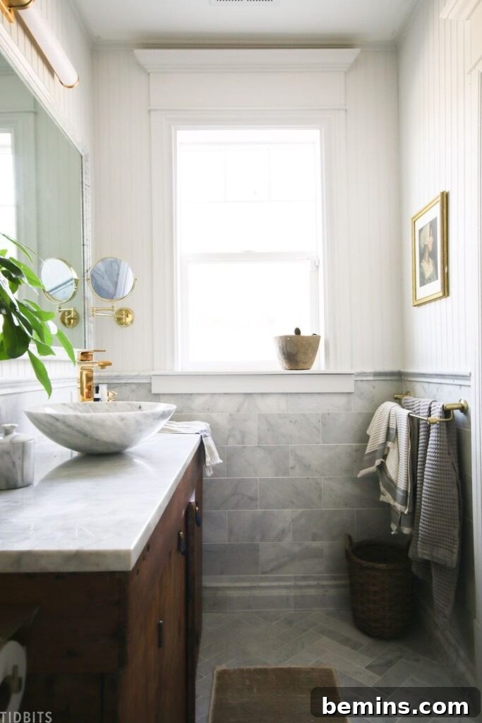 Bathroom with blue gray textured wainscoting 
