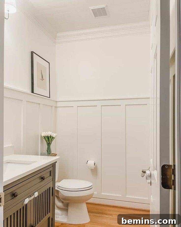 Bathroom with neutral board and batten paneling