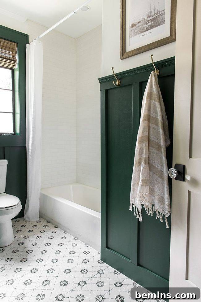 Green wainscoting and tile floor