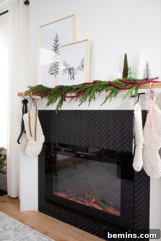 Black tile surrounding a electric fireplace