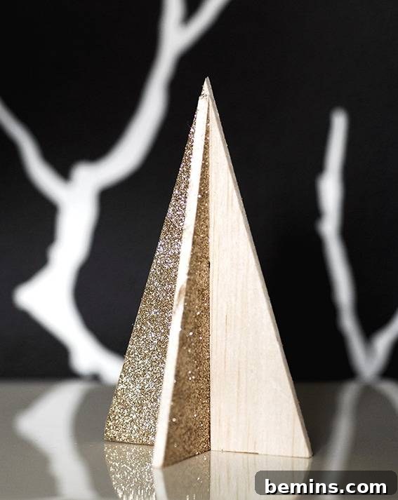 Wooden tabletop Christmas tree with glitter paint