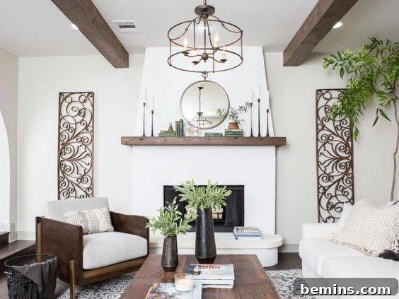 White stucco fireplace in a living room with brown accents and a Mediterranean feel