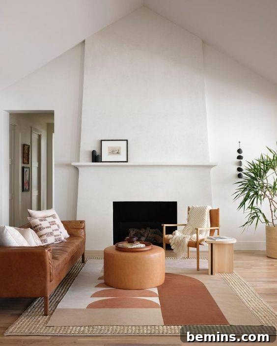 White stucco fireplace in a mid-century modern living room with a brown couch, rug, and coffee table
